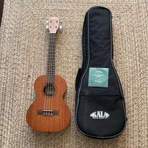 Kala satin mahogany ukelele w/ carry bag and extra strings